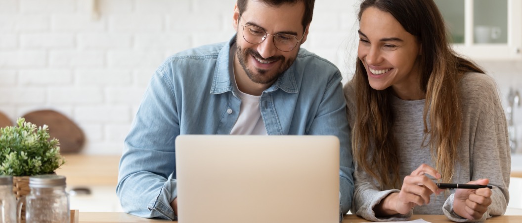 money market savings account near syracuse ny excited couple on laptop geddes federal savings