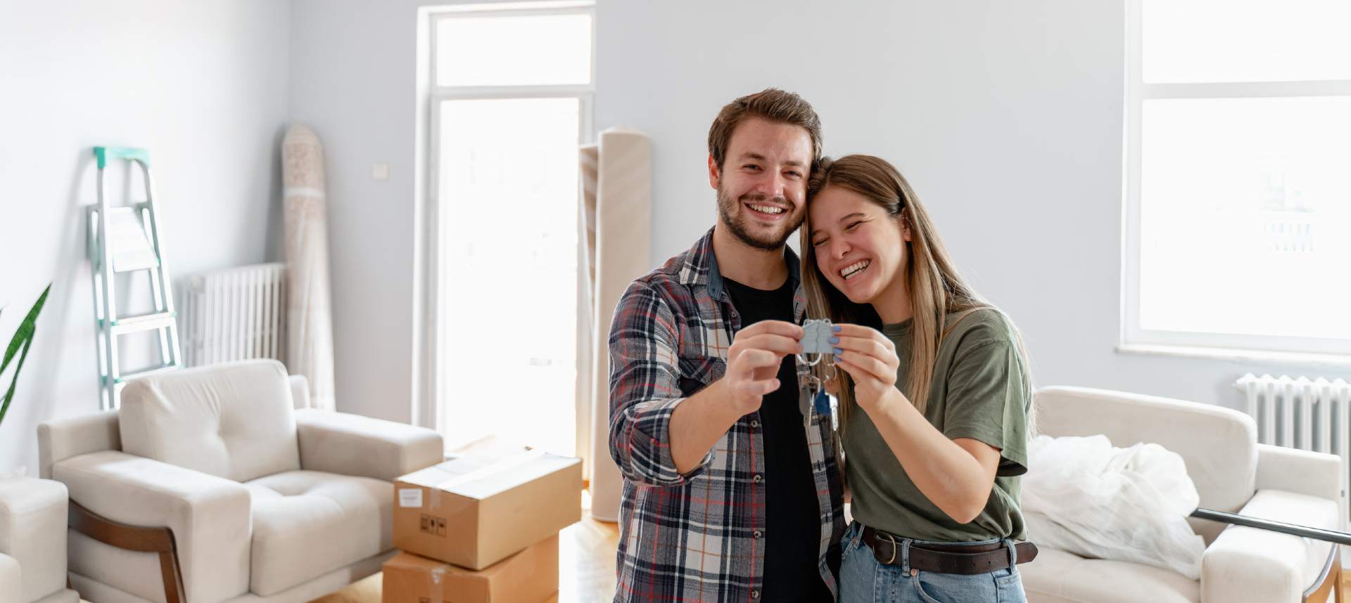 mortgage loan near syracuse ny couple holding keys to new house geddes federal savings