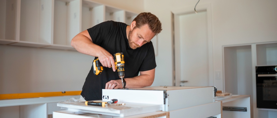 home equity loans near syracuse ny for home renovations working on kitchen with drill