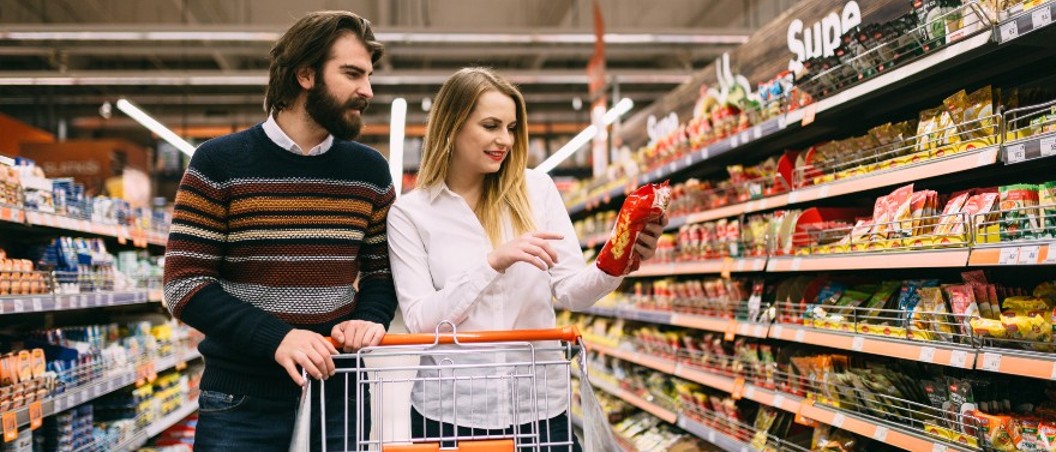 young couple grocery shopping From Checking to Savings and Loans Get It at Geddes federal savings and loan near syracuse ny