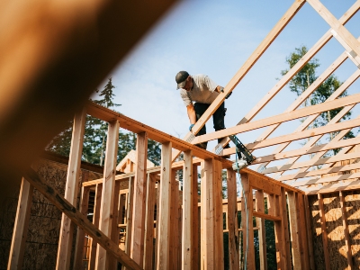 construction loans near syracuse ny worker framing new home